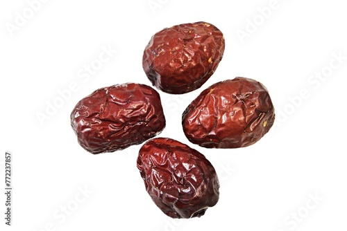 four of dry jujube on white background