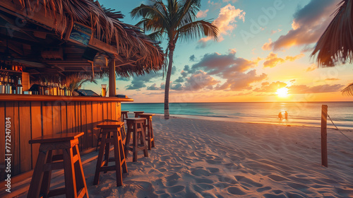 A beach bar on a tropical shore with vibrant pink and blue sunset skies reflecting on tranquil sea waters.