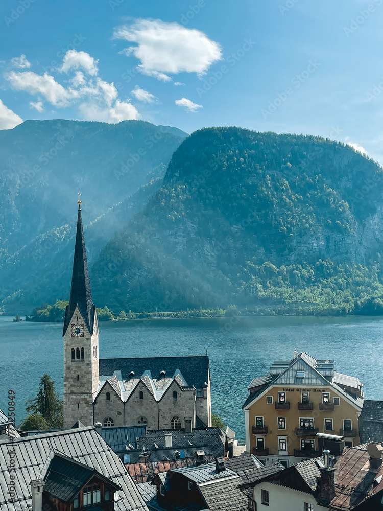 The beauty of Hallstatt, Austria, a charming village nestled amidst the Austrian Alps. Picturesque scenes of Hallstatt await, including its iconic lakeside setting and colorful houses.