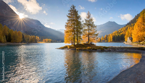 Morning ambiance at Lake Sils, with an island adorned by autumn larches, located in Engadin, Canton of Grisons, Switzerland, Europe