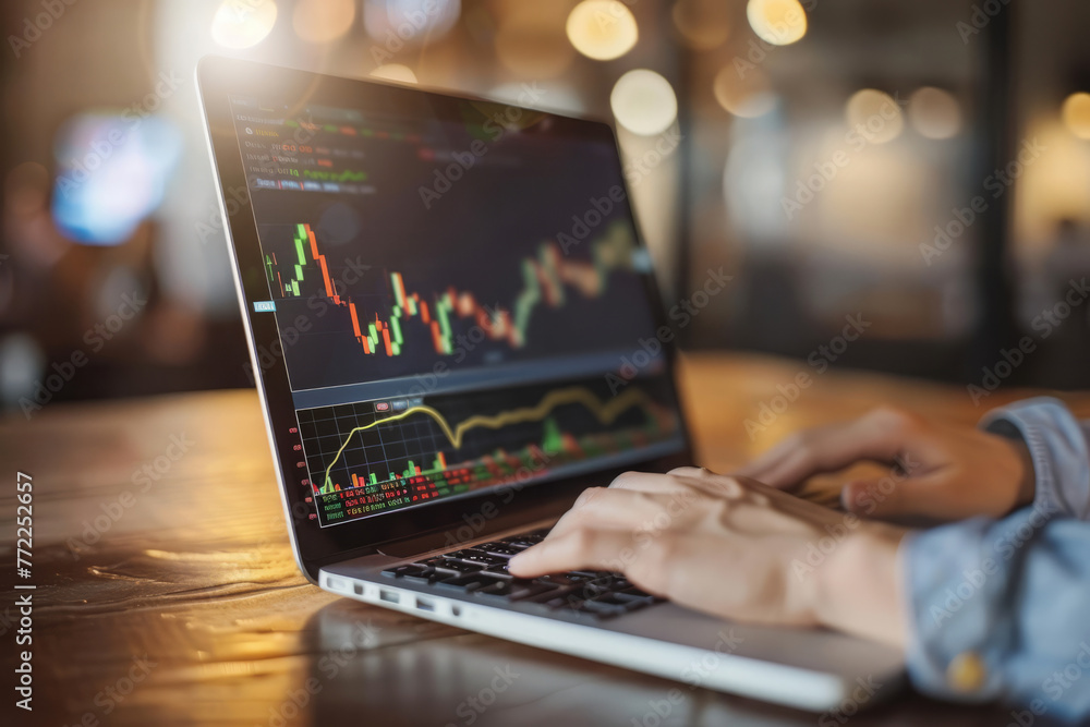 Financial charts and data on laptop screen. Trader analyzes financial information to develop market strategy. Businessman investor working on computer Financial charts and data on laptop screen. Trader analyzes financial information to develop market strategy. Businessman investor working on computer