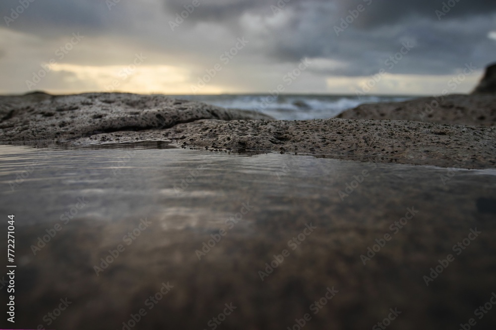 Fototapeta premium Beautiful shot of the scenic rocky White Cliff Bay of the Isle of Wight on a gloomy day