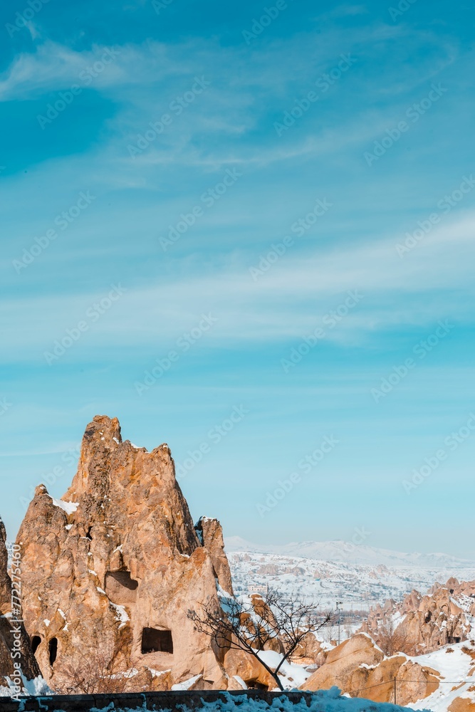 Beautiful shot of the fairy chimneys in Cappadocia on a snowy day