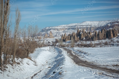 Beautiful shot of the fairy chimneys in Cappadocia on a snowy day