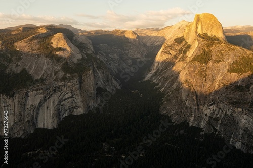 The Glacier Point overlook in Yosemite Valley, presenting a view of the Half Dome and Yosemite Falls © Wirestock