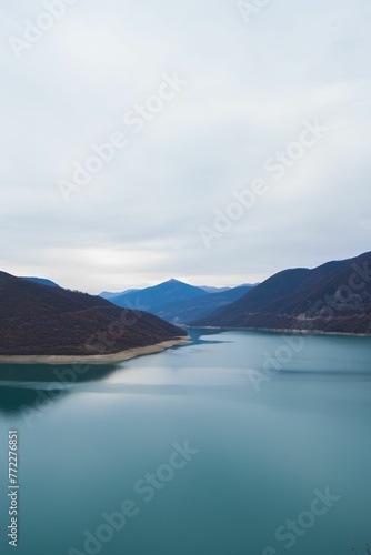 Scenic view of Zhinvalskoe Reservoir, Georgia on a cloudy day © Wirestock