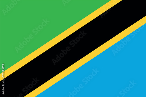 Flag of Tanzania. Tanzanian green and blue flag with diagonal black and yellow stripes. State symbol of the United Republic of Tanzania. photo