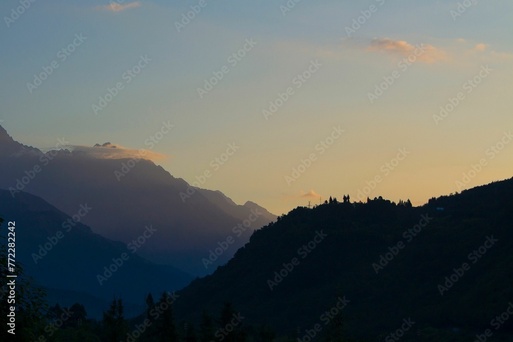Scenic view of a mountain range at sunset in Pengzhou, Chengdu, Sichuan, China