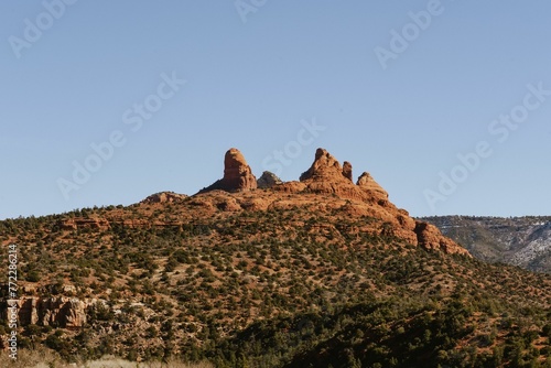 Scenic view of the red rock formations against blue sky in Sedona, Arizona