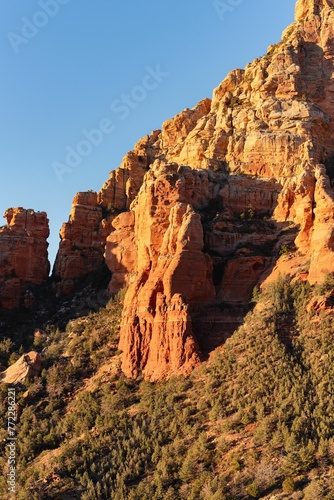 Scenic view of the red rock formations against blue sky in Sedona  Arizona