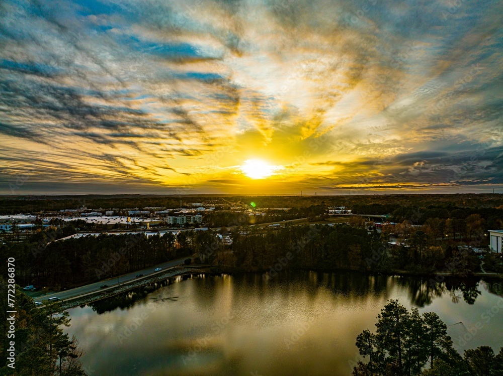 Aerial view of Harbison Lake, located in South Carolina featuring a beautiful sunset