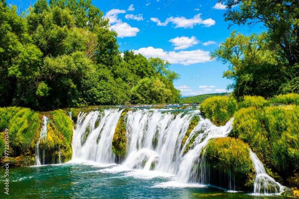 Scenic view of the Kocusa Waterfall in Bosnia and Herzegovina. Scenic view of the Kocusa Waterfall in Bosnia and Herzegovina.