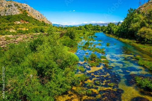 Scenic aerial view of the flowing Bunski Kanal Most in Bacevici  Bosnia and Herzegovina