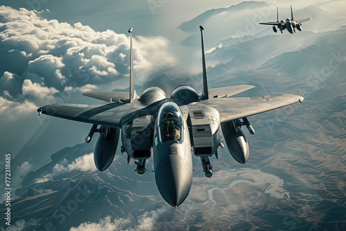 two fighter jets flying in the sky above the clouds