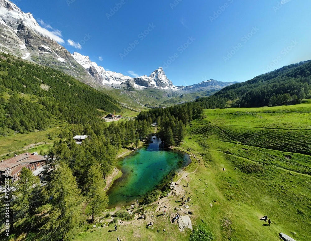 Aerial view of Lago Blu, a picturesque mountain lake located in the Italian Alps.