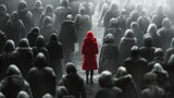 Silhouette of a woman in a red coat on a crowd of people