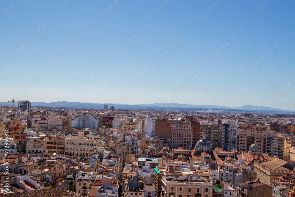 Obraz premium View of the old town of Valencia from the roof of Roman Catholic church in Plaza de la Reina