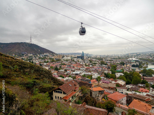 The beautiful view of tbilisi town city and cable car, Georgia. photo