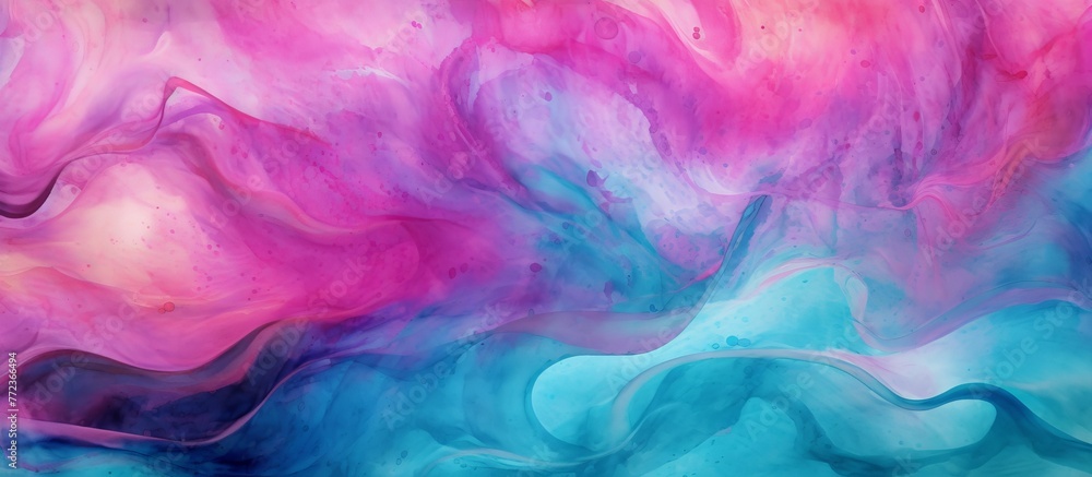 Close up of a swirl of pink and blue ink resembling a watercolor painting