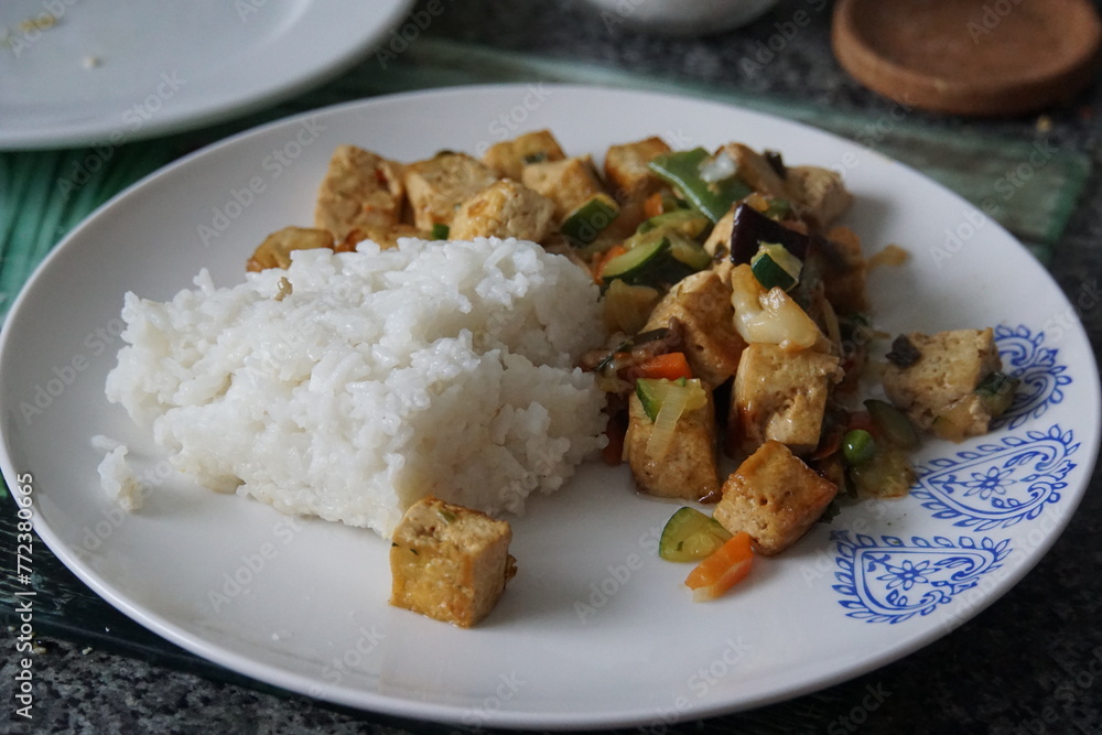 Fried tofu, stir fry, fried vegetables, rice, chinese cuisine, cooking Fried tofu, stir fry, fried vegetables, rice, chinese cuisine, cooking