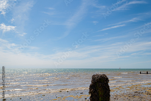 View out to sea from Bognor Regis beach, with breakwater post in the foreground