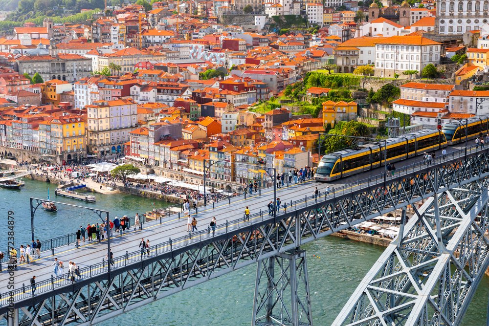 Famous bridge Ponte dom Luis above old town of Porto at river Duoro, Portugal