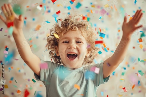 Funny Kid surprised to win with confetti around