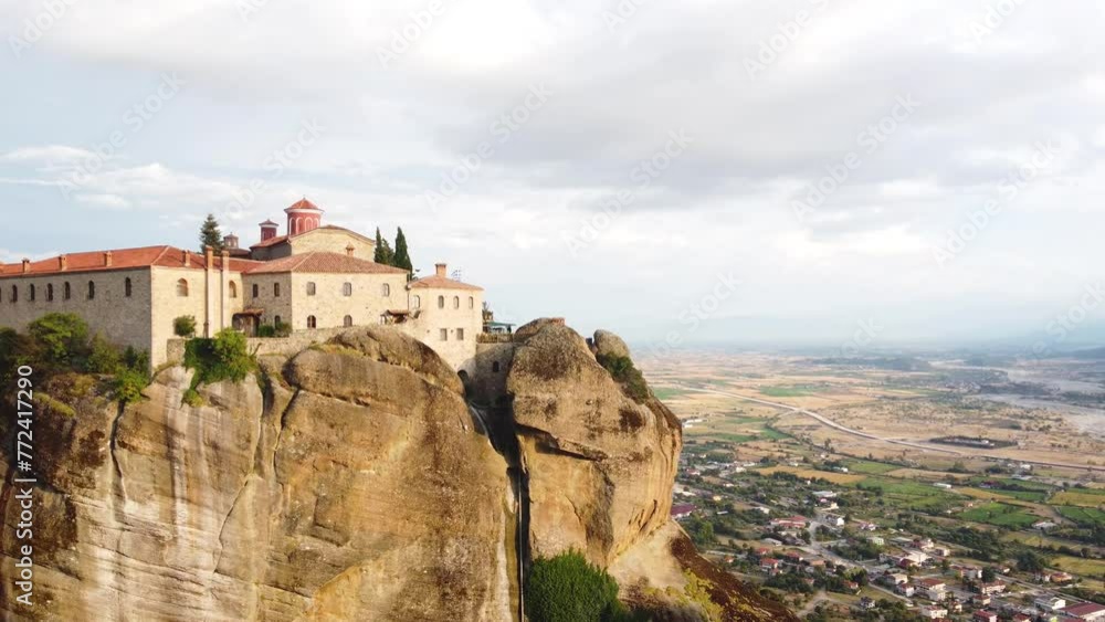 Aerial view of Monastery of Saint Stephen (Agios Stefanos Monastery) in Meteora, Greece. St. Steven Monastery, a UNESCO World Heritage site. Aerial view of Monastery of Saint Stephen (Agios Stefanos Monastery) in Meteora, Greece. St. Steven Monastery, a UNESCO World Heritage site.