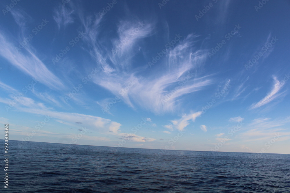 Fototapeta premium Beautiful ocean sunset in offshore New Jersey near windfarms