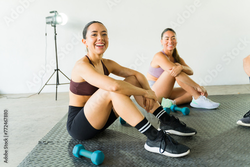 Smiling women enjoying fitness class