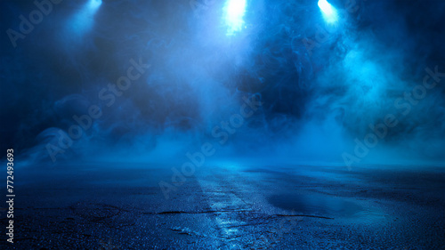 Neon illumination of the night street, dark blue background, empty stage with spotlights reflecting on the pavement, with floating smoke, atmosphere of night city life.
