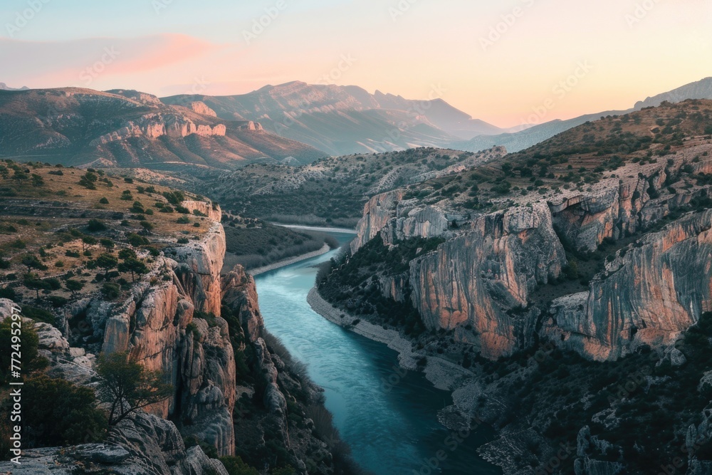 Scenic view of river flowing through rocky canyon, ideal for nature and outdoor themes