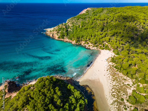 Aerial drone view of Menorca beach at cala de Algariens, Spain