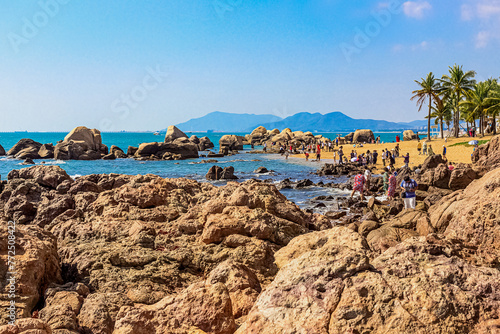 View of the rocky shore of the South China Sea in the World's End Park. Sanya, China