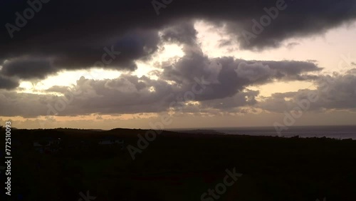 Time Lapse Video of a Hawaiian Sunrise over Poipu, Kauai. louds forming and contracting as rain squalls and wind pass by the town of Poipu and Kalaheo during a memorable Hawaiian sunrise. 