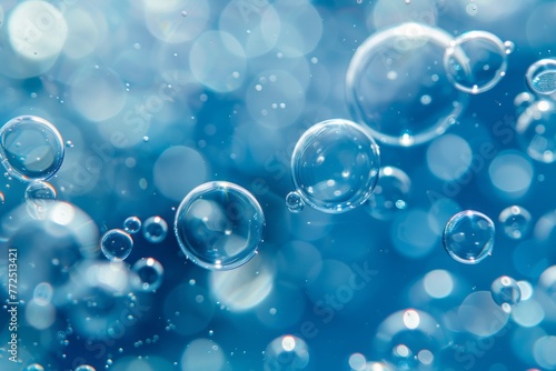 Effervescent Blue Water: Macro Texture with Sparkling Bubbles and Clear Drops.