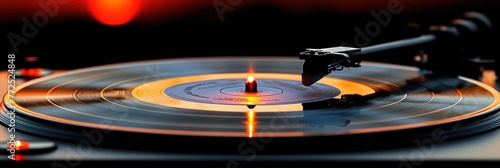 A record player spinning a vinyl record on a turntable photo
