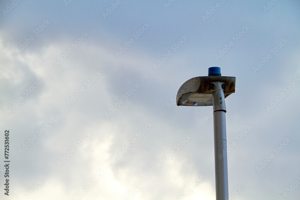 Street lamp on blue sky