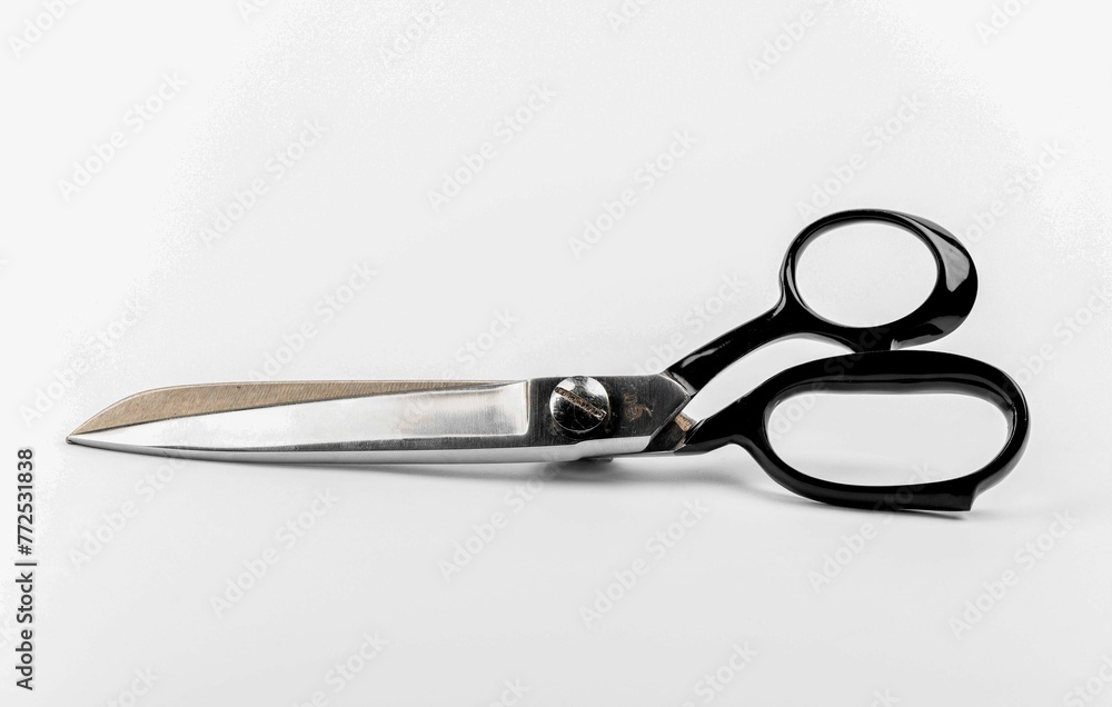 Scissors with an isolated white background Scissors with an isolated white background