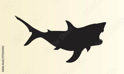 Black silhouette of a great white shark. Vector on a yellow background © Dima