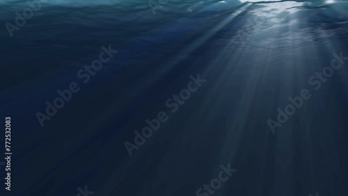 Realistic underwater scene with sun rays and nice glowing light.  photo