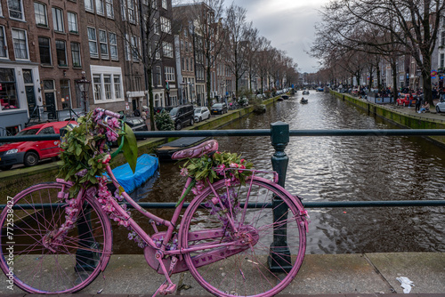 Amsterdam downtown - Amstel river, old houses and a bridge. Travel to Europe. Holland, Netherlands, Europe.