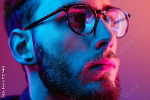 Intense Gaze - Man with Glasses on Neon Lit Background