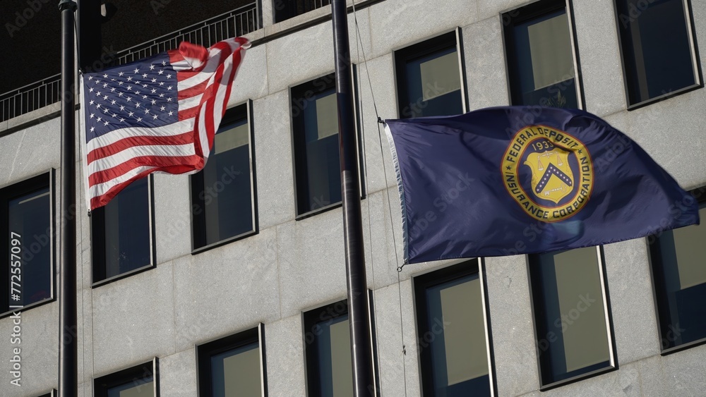 Flags in front of Federal Deposit Insurance Corporation building in Washington, DC. - obrazy, fototapety, plakaty 