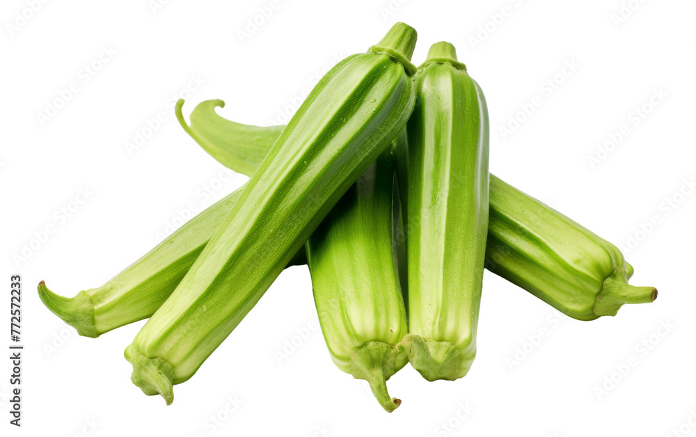 A collection of vibrant green corn husks arranged on a pristine white surface A collection of vibrant green corn husks arranged on a pristine white surface