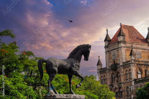 Majestic Horse Statue  Sunset View by a Gothic European Castle.