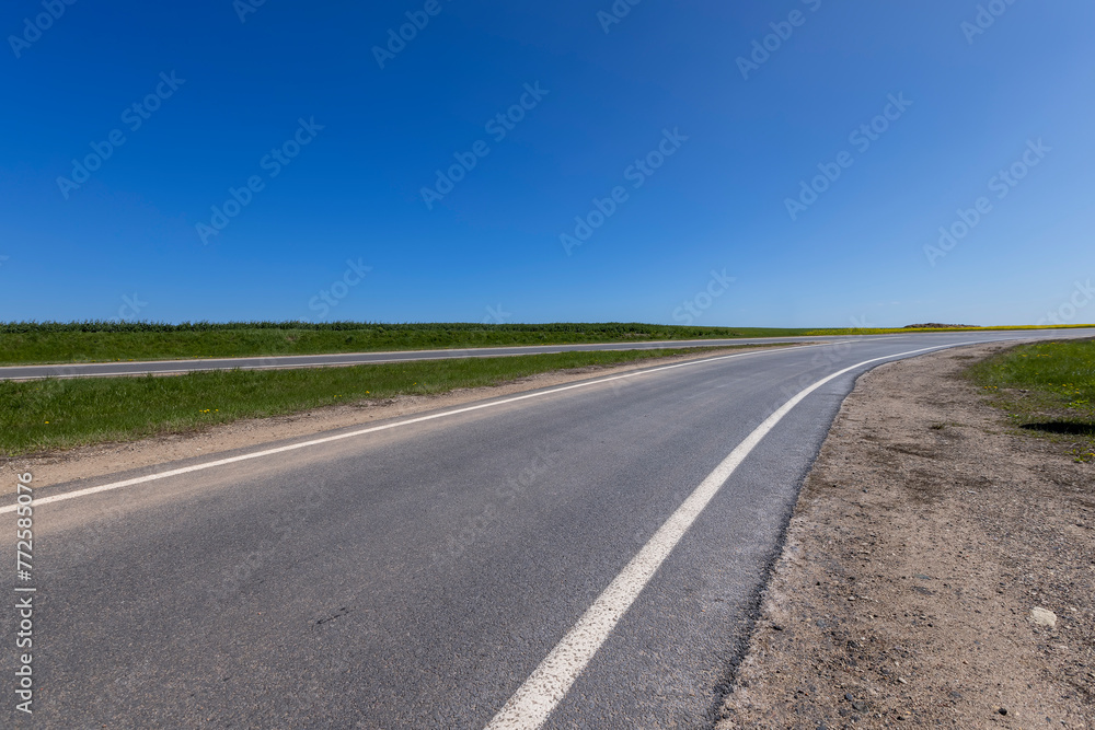 details of a highway with a white painted line details of a highway with a white painted line