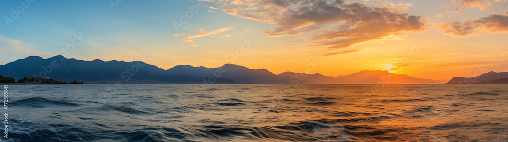 Panoramic Sunset over Mountainous Lake Landscape