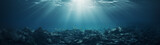 Underwater Sunlight and Fish over Rocky Seabed