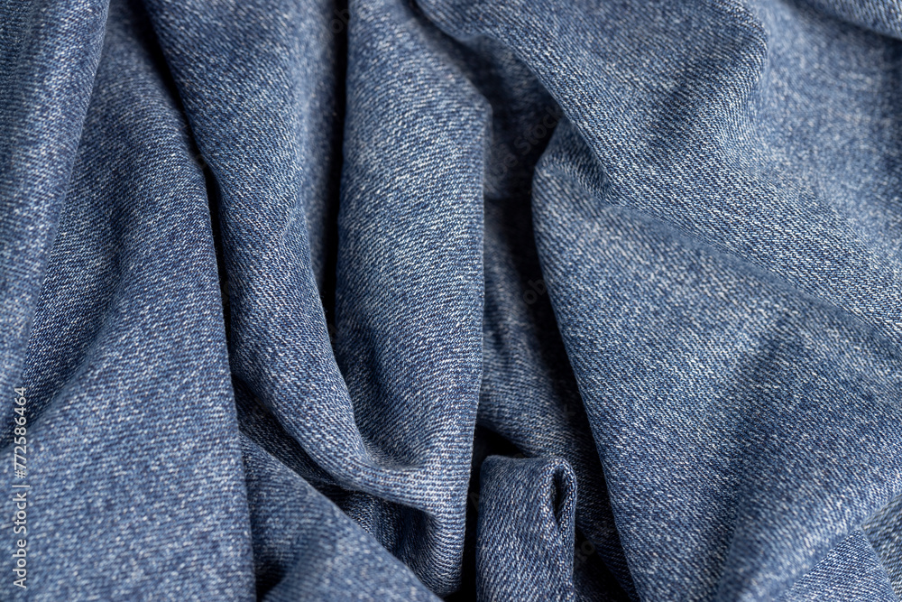 Fototapeta premium details of clothes made of blue denim soft fabric
